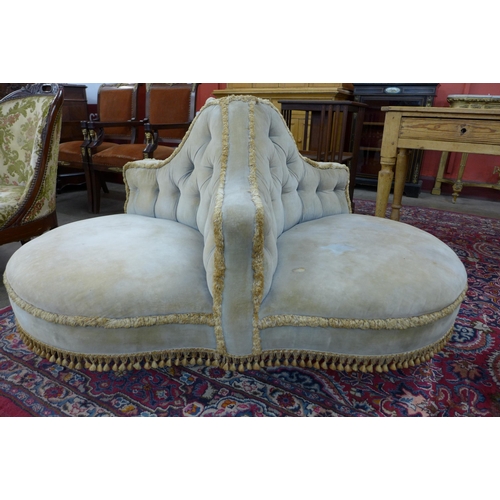 16 - A Victorian fabric upholstered three seater conversation seat