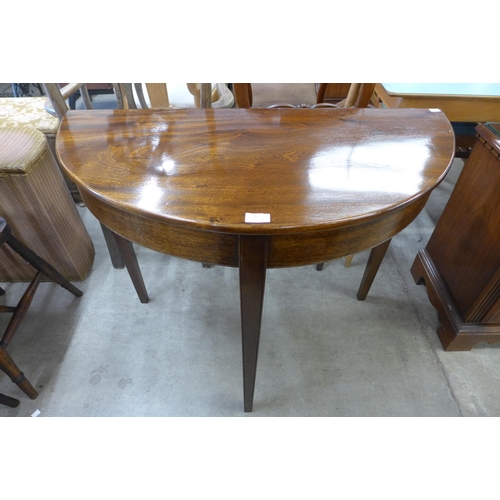 163 - A George III style mahogany bow front side table