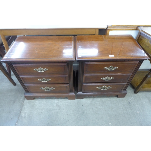 164 - A pair of George III style mahogany bedside chests of drawers