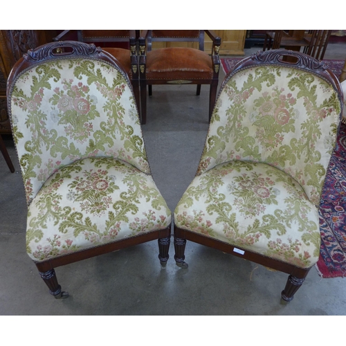 18 - A pair of George IV carved mahogany and fabric upholstered lady's chairs, manner of Gillows