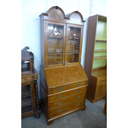 180 - A George I style burr elm bureau bookcase