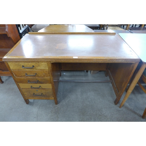 187 - An oak desk