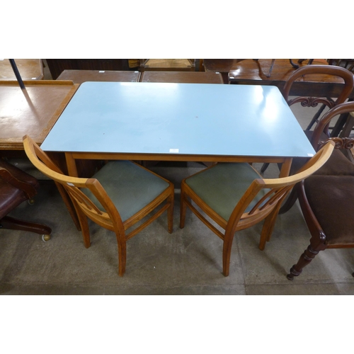 192 - A mid 20th Century beech and Formica topped kitchen table and two chairs