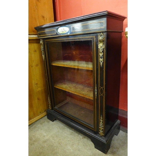 2 - A 19th Century French inlaid ebonised and gilt metal mounted pier cabinet