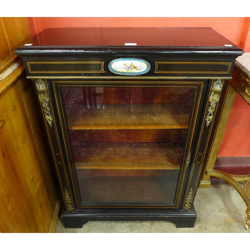 2 - A 19th Century French inlaid ebonised and gilt metal mounted pier cabinet