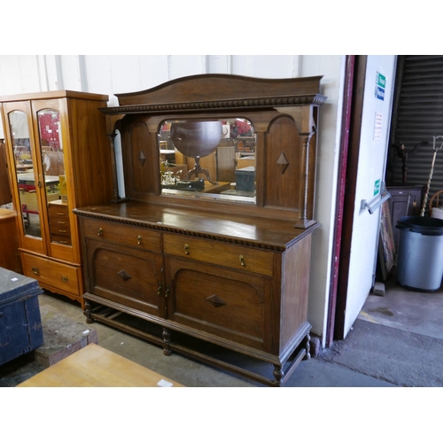 213 - An Edward VII oak mirrorback sideboard