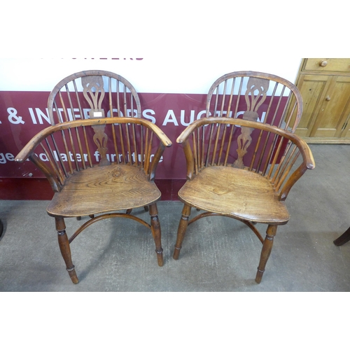 22 - A pair of 19th Century elm and yew Windsor chairs