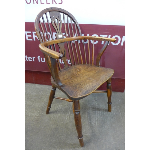 22 - A pair of 19th Century elm and yew Windsor chairs