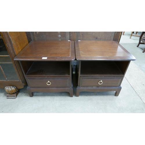 221 - A pair of Stag Minstrel mahogany bedside chests