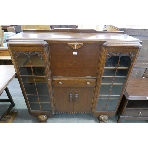 222 - An oak side by side bureau bookcase