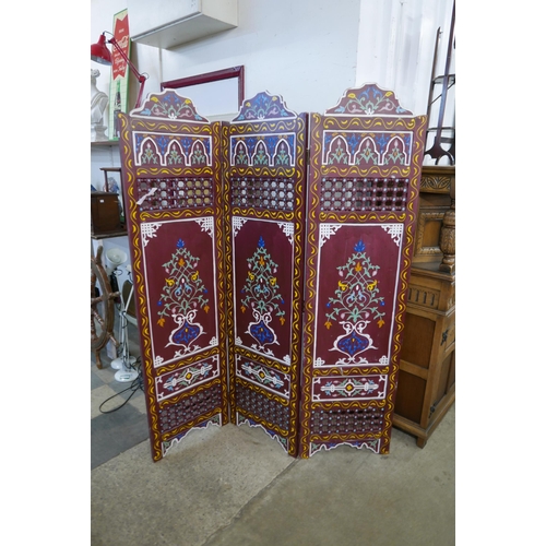 227 - A Moorish painted wooden folding dressing screen