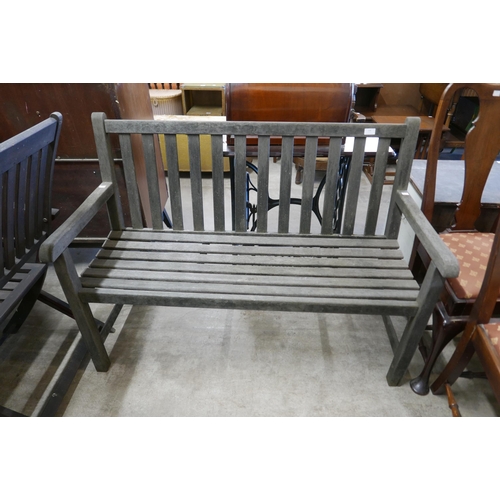 238 - A teak garden bench