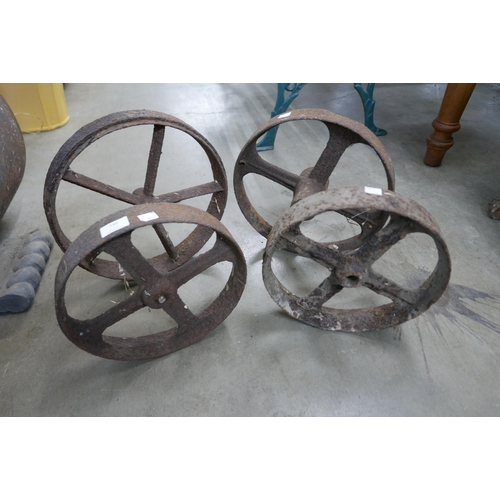 246 - Four cast iron wheels