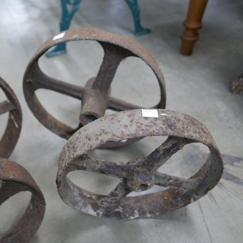 246 - Four cast iron wheels