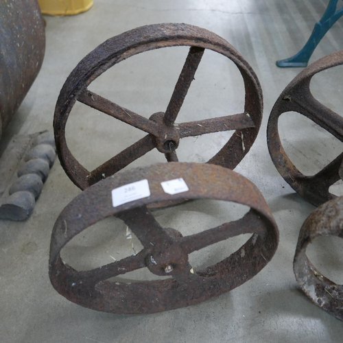 246 - Four cast iron wheels