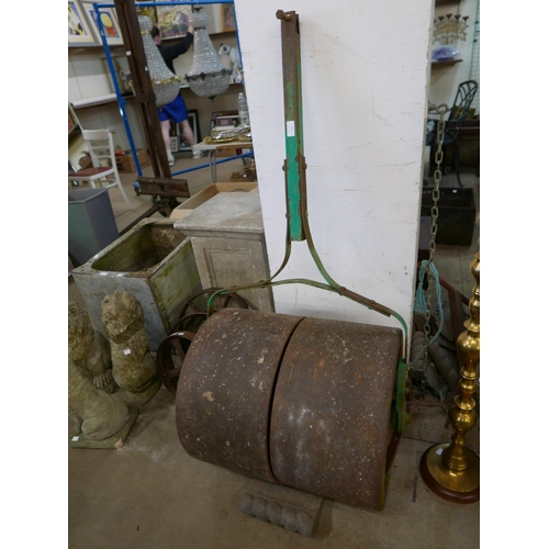 247 - A vintage cast iron garden roller