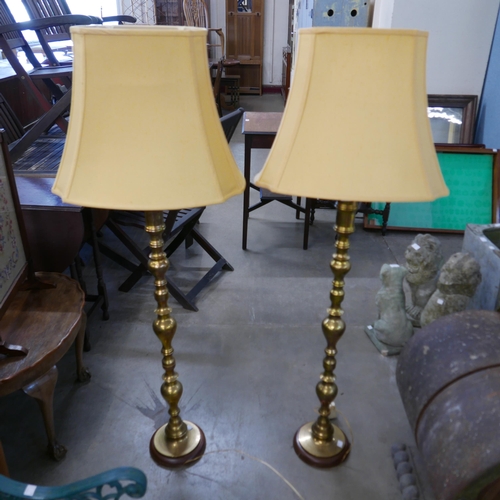 249 - A pair of vintage eastern brass floor standing lamps