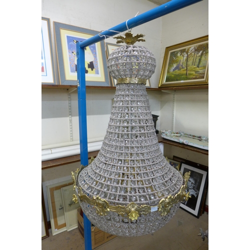 277 - A pair of similar French Empire style bag shaped chandeliers