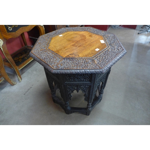 28 - A late 19th Century Indian carved hardwood octagonal occasional table