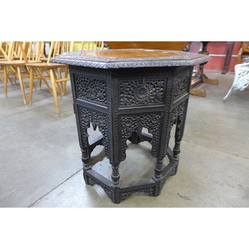 28 - A late 19th Century Indian carved hardwood octagonal occasional table