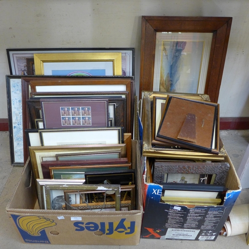 294 - A large quantity of paintings, prints and frames