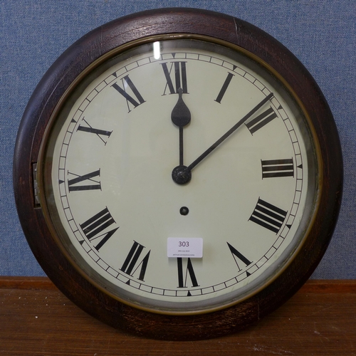 303 - A Victorian oak circular wall clock