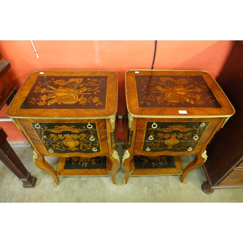 31 - A pair of French Louis XV style mahogany and marquetry effect three drawer gueridon tables