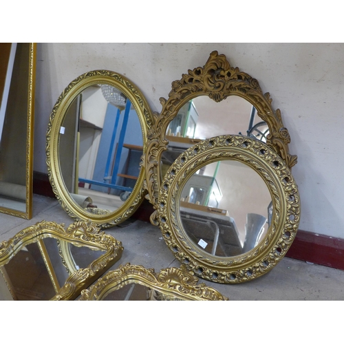 310 - Six gilt framed mirrors