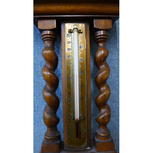 312 - A Short & Mason of London walnut aneroid barometer