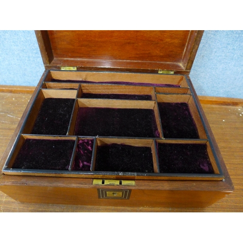 317 - A Victorian inlaid walnut lady's jewellery box