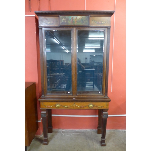 32 - A Victorian Sheraton Revival painted mahogany and satinwood side cabinet