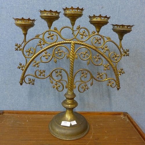 320 - A late 19th Century French ecclesiastical brass candelabra