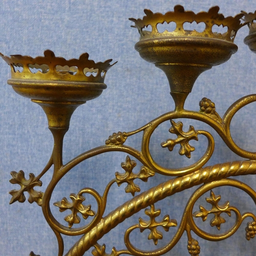 320 - A late 19th Century French ecclesiastical brass candelabra