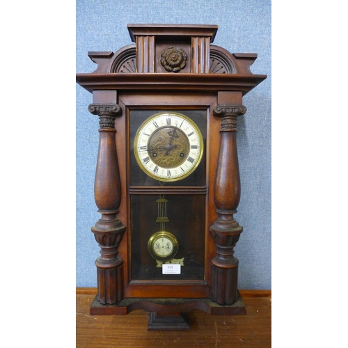 325 - A 19th Century beech Vienna wall clock and a Victorian oak cutlery box