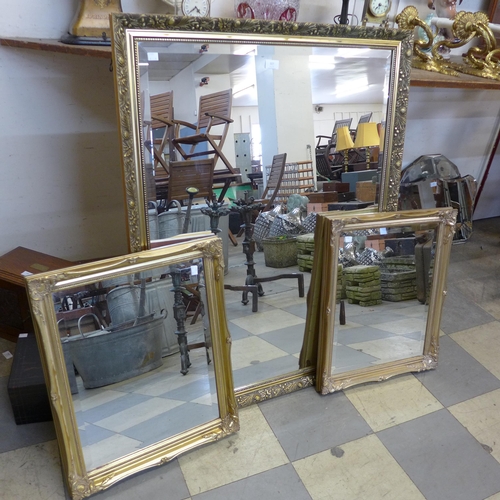 327 - Four gilt framed mirrors