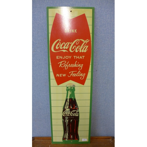 334 - A vintage painted Coca-Cola advertising sign