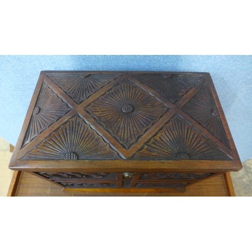 337 - A Victorian carved walnut stationery cabinet/writing slope