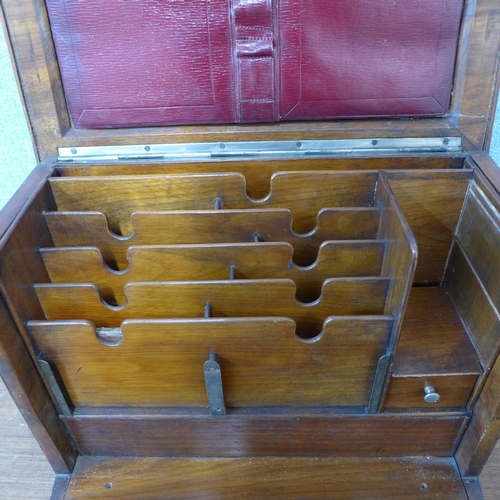 337 - A Victorian carved walnut stationery cabinet/writing slope