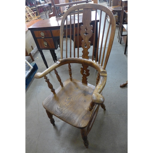 39A - A 19th Century elm and beech highback Windsor chair