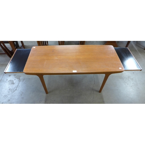 54 - A McIntosh teak extending coffee table