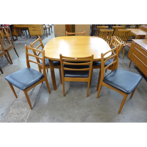 58 - A G-Plan Sierra teak extending dining table and six chairs