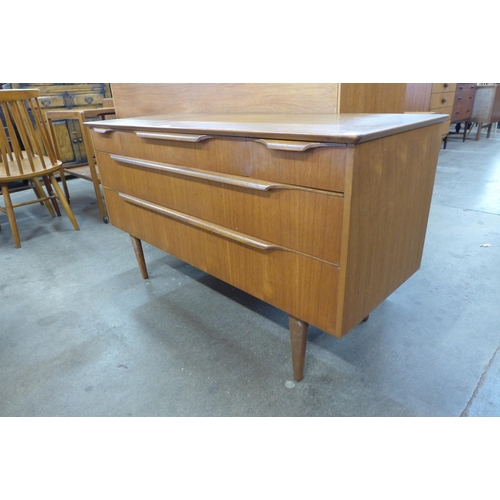 59 - A small teak sideboard