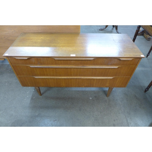 59 - A small teak sideboard