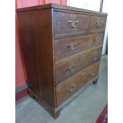 6 - A George III oak chest of drawers