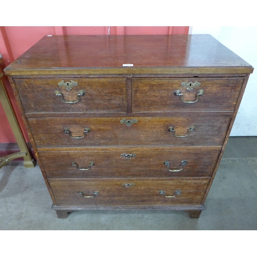 6 - A George III oak chest of drawers