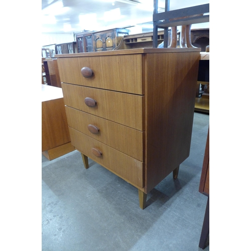 64 - A teak chest of drawers