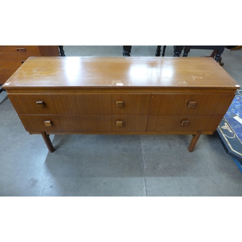 66 - A Remploy teak four drawer sideboard