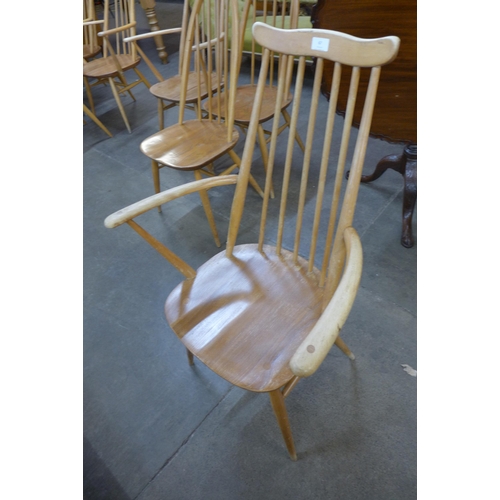 67 - A pair of Ercol Blonde elm and beech Goldsmith chairs and a pair of Quaker chairs