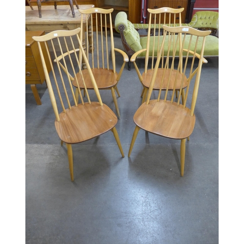 68 - A set of four Ercol Blonde elm and beech Goldsmith chairs