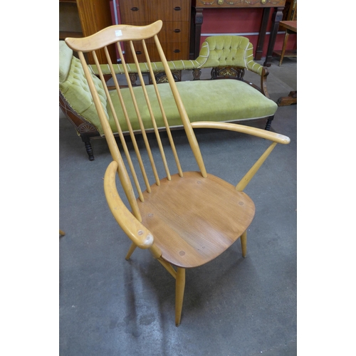 68 - A set of four Ercol Blonde elm and beech Goldsmith chairs